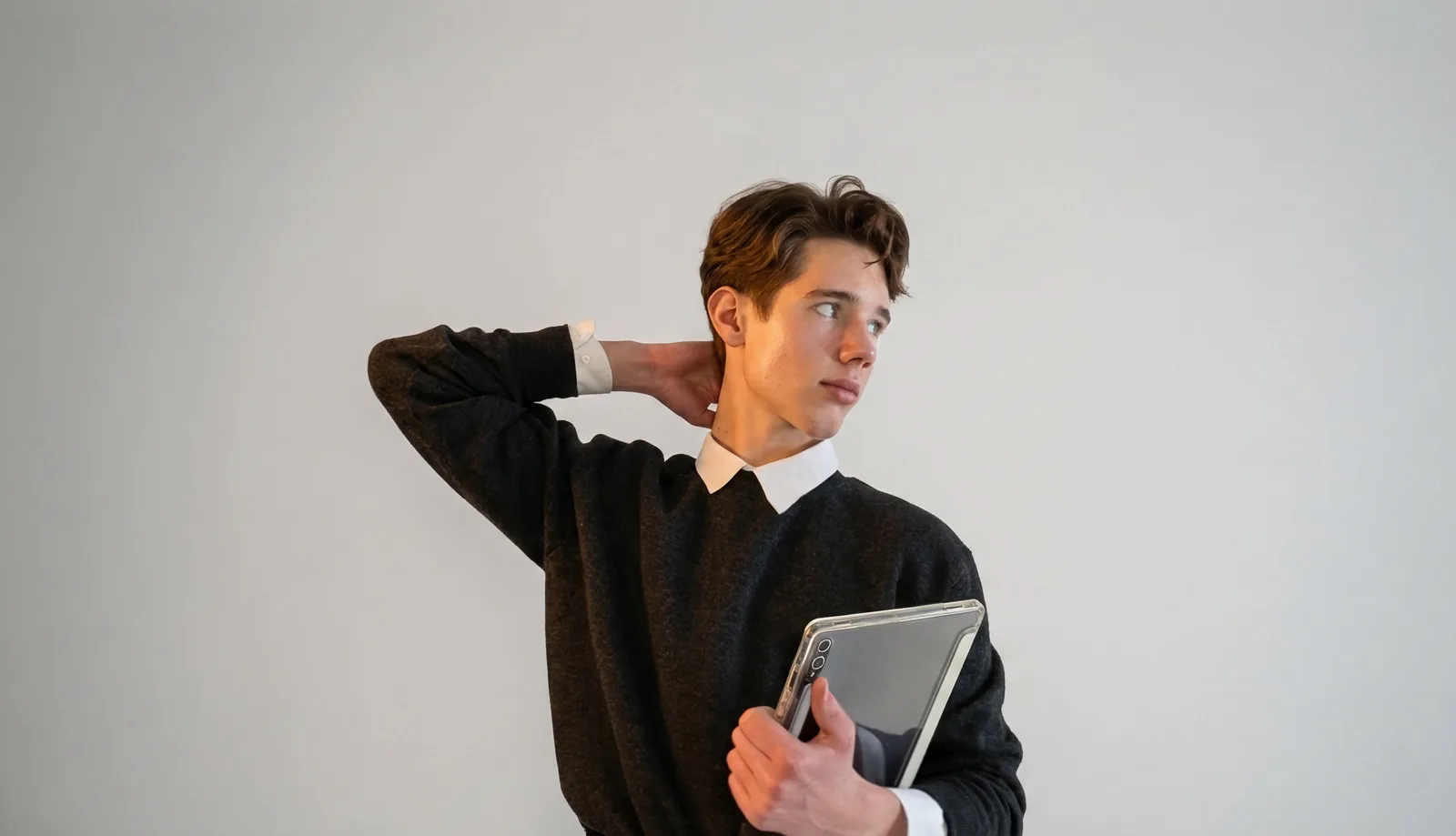Artem Kachan holding a tablet